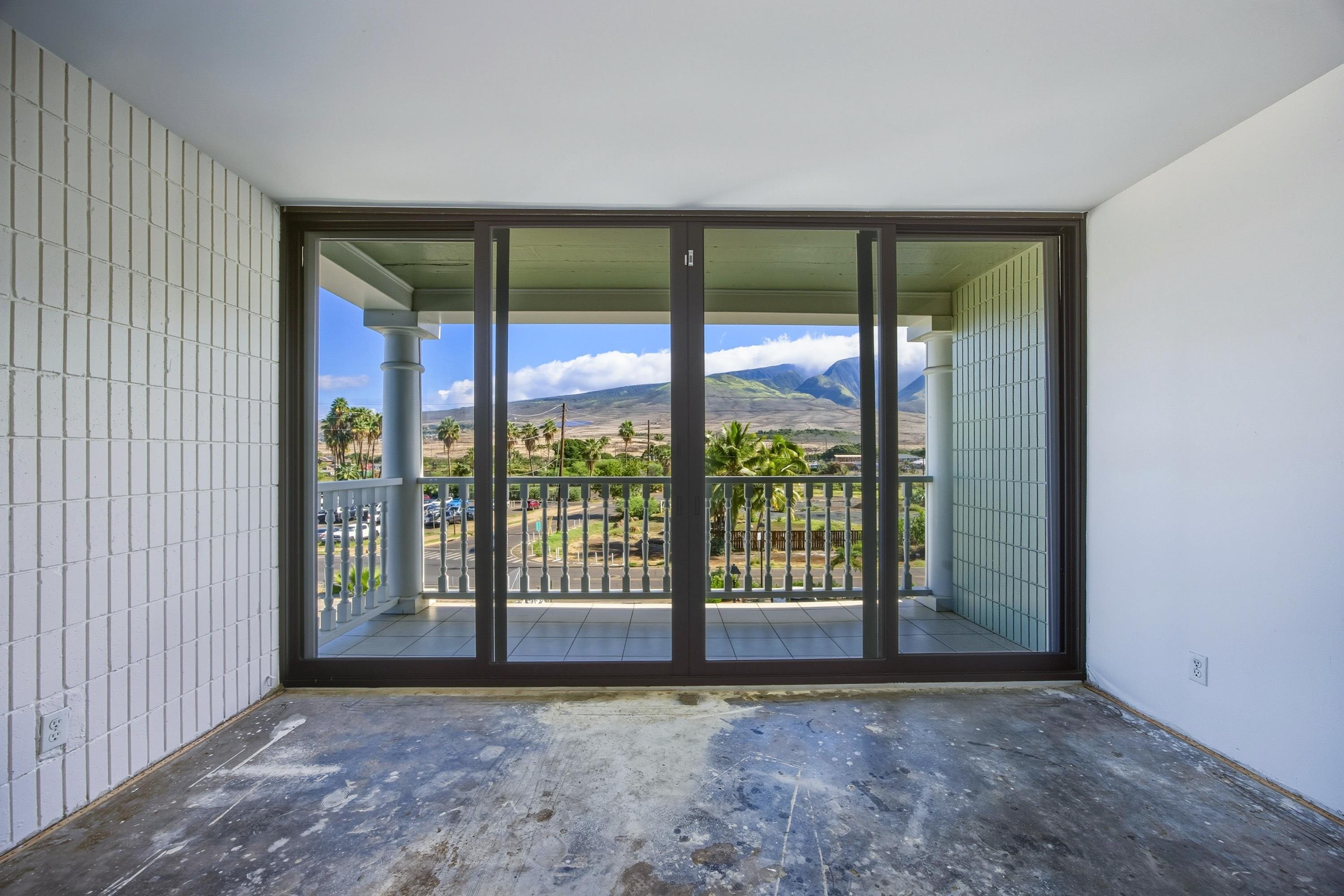 475 Front Street, Unit 334 Lahaina, HI 96761 - Photo 7 of 36 an empty room with floor to ceiling windows