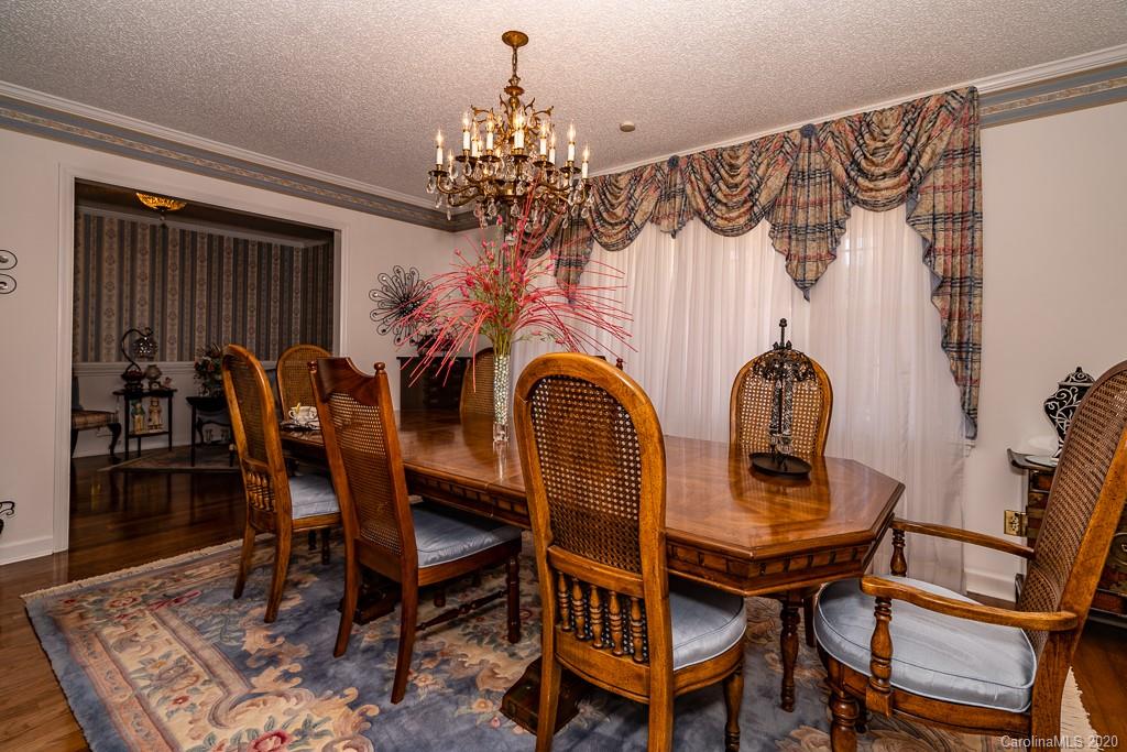 2901 (3 Acres) Screaming Eagle Road Lugoff, SC 29078 - Photo 17 of 48 a view of a dining room with furniture and chandelier
