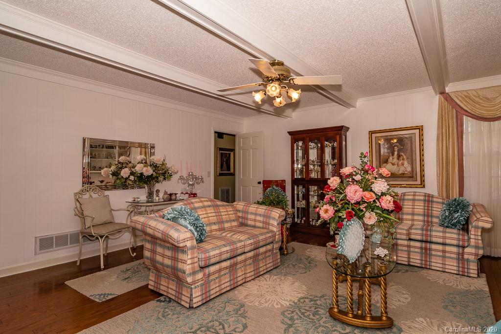 2901 (3 Acres) Screaming Eagle Road Lugoff, SC 29078 - Photo 30 of 48 a living room with furniture flowerpot and a chandelier