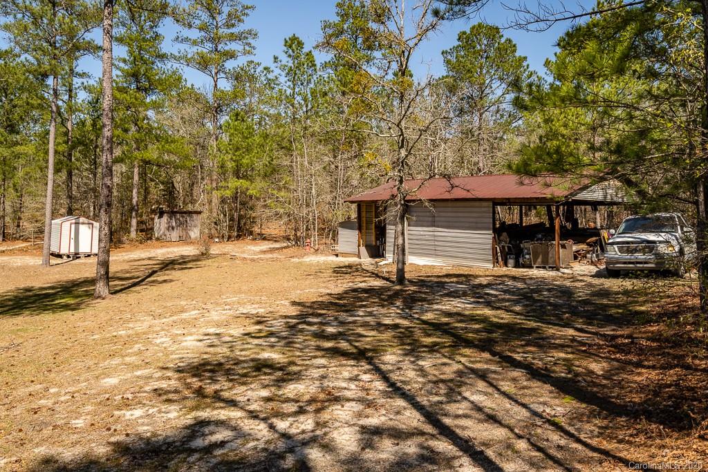 2901 (3 Acres) Screaming Eagle Road Lugoff, SC 29078 - Photo 47 of 48 a front view of a house with a yard
