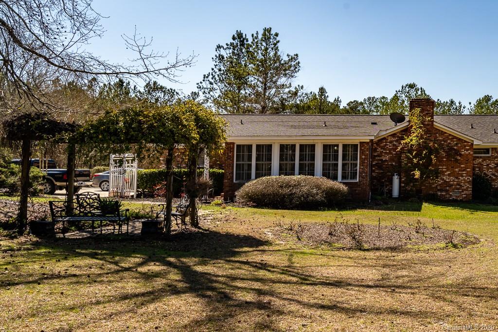 2901 (3 Acres) Screaming Eagle Road Lugoff, SC 29078 - Photo 48 of 48 a front view of a house with swimming pool