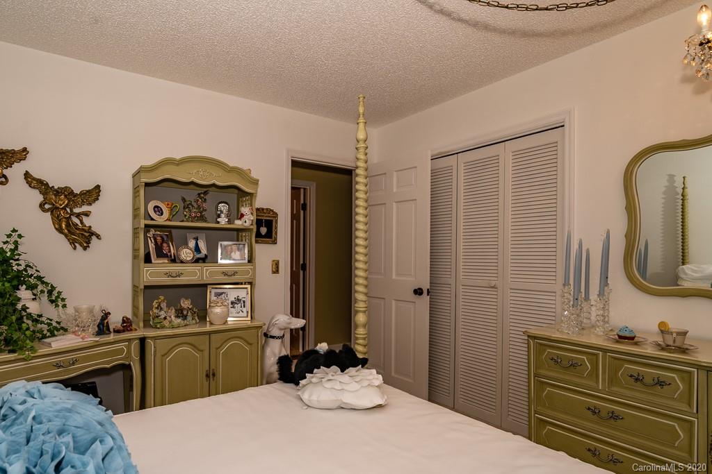 2901 (3 Acres) Screaming Eagle Road Lugoff, SC 29078 - Photo 8 of 48 a bedroom with a bed and a dresser in it