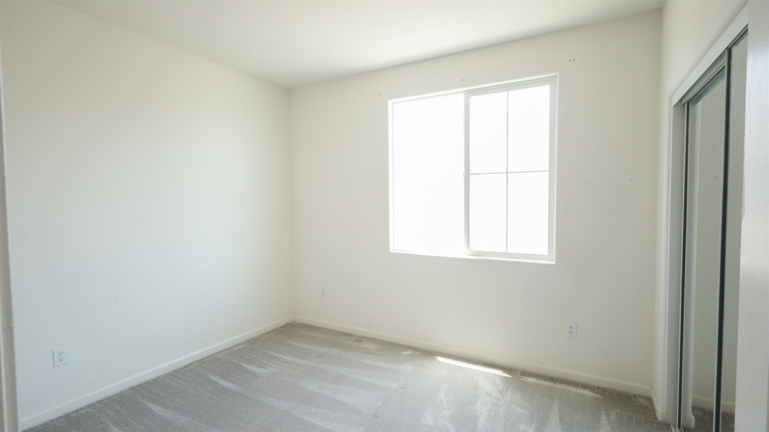 45 Parc Pl Drive Milpitas, CA 95035 - Photo 4 of 9 an empty room with a window