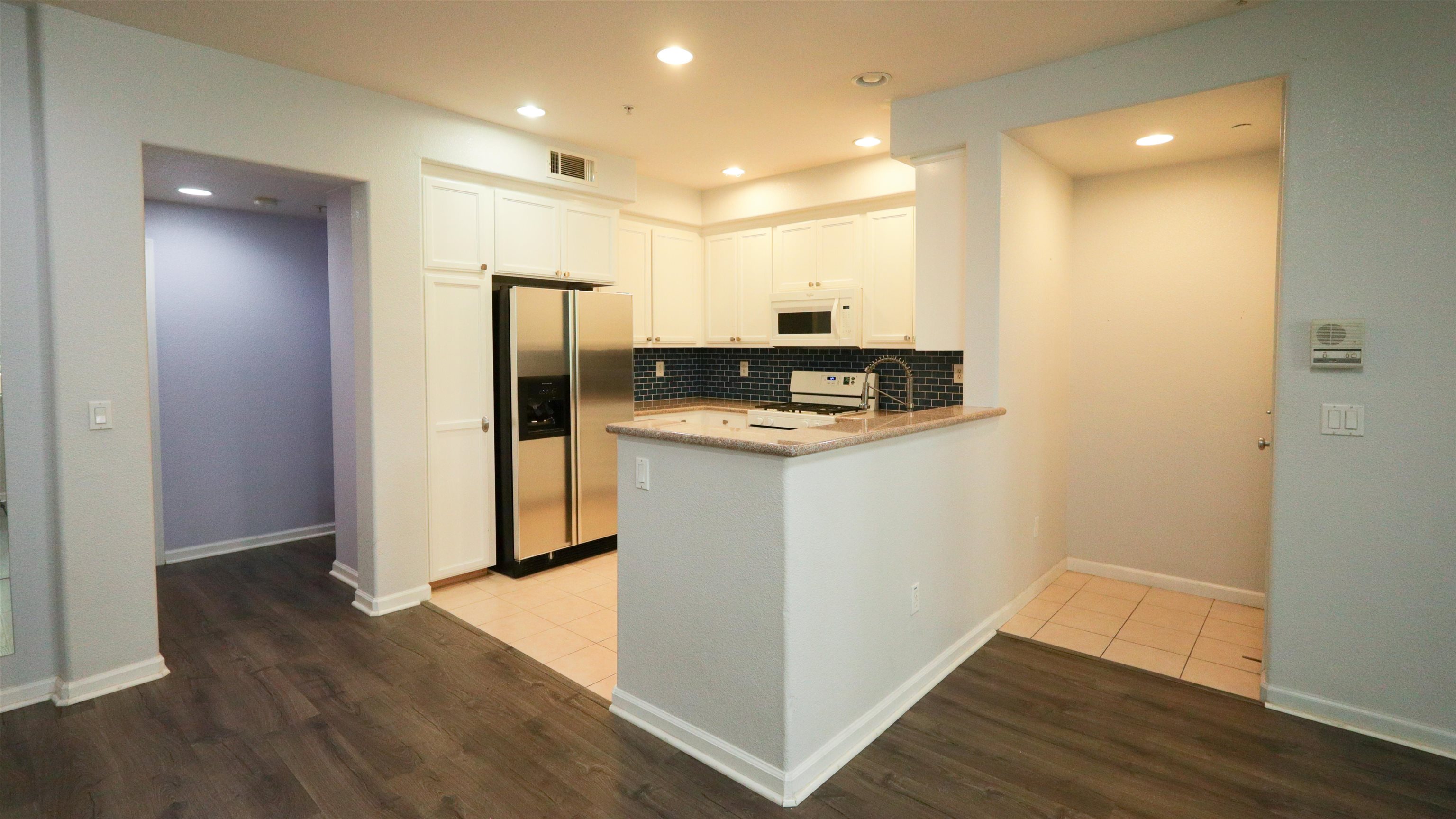 45 Parc Pl Drive Milpitas, CA 95035 - Photo 5 of 9 a kitchen with stainless steel appliances granite countertop a refrigerator and a sink