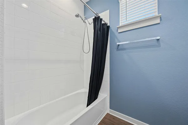 a bathroom with a bathtub