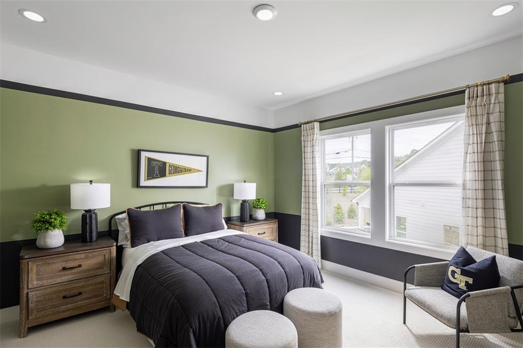 214 Mooney Road Woodstock, GA 30188 - Photo 13 of 17 a spacious bedroom with a bed and glass window