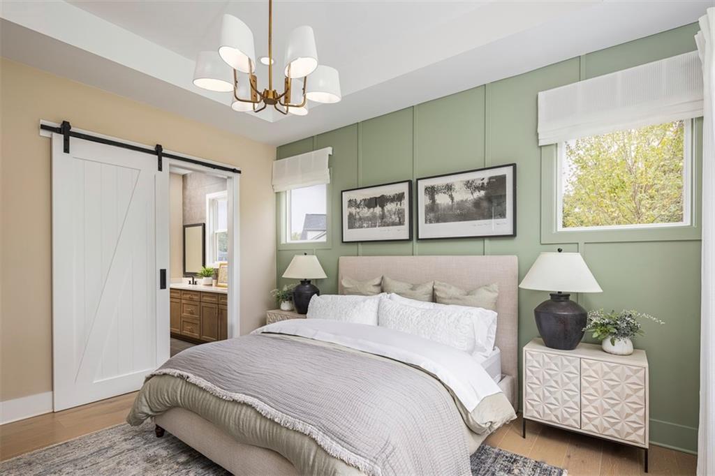 214 Mooney Road Woodstock, GA 30188 - Photo 9 of 17 a bedroom with a bed couch and window