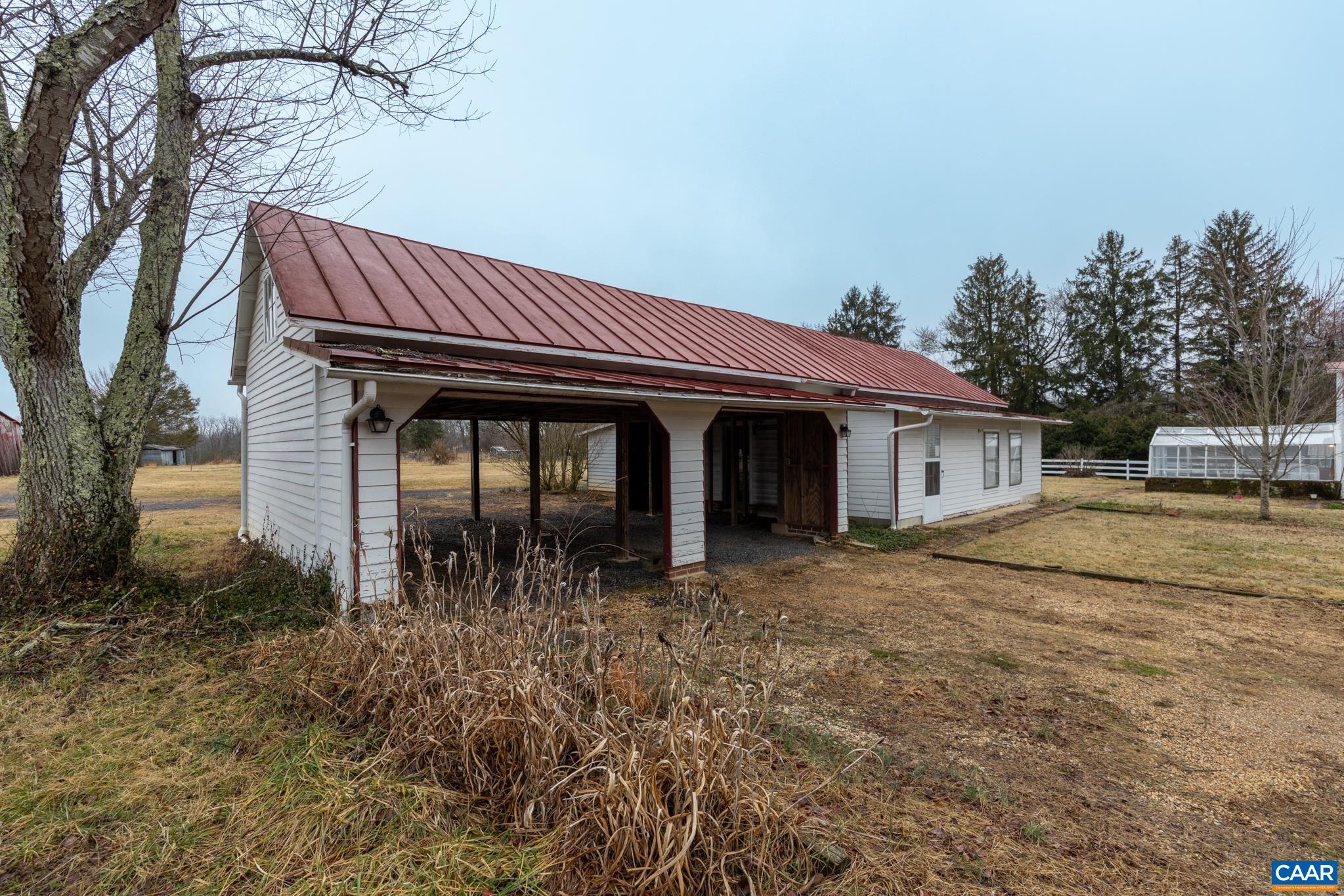 9451 Black Walnut Run Road Rhoadesville, VA 22542 - Photo 49 of 73 a view of a house with backyard