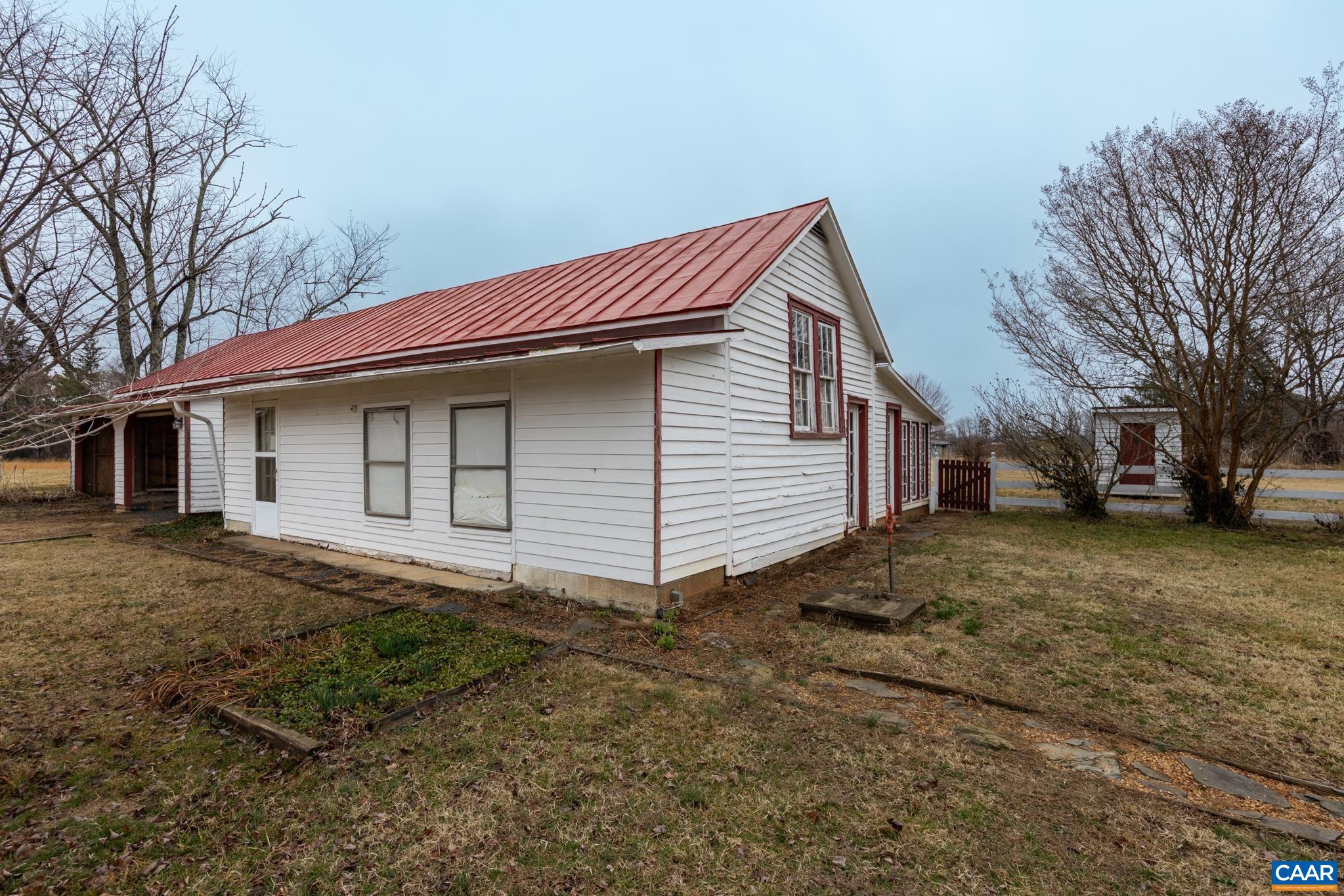 9451 Black Walnut Run Road Rhoadesville, VA 22542 - Photo 50 of 73 a view of a house with a yard