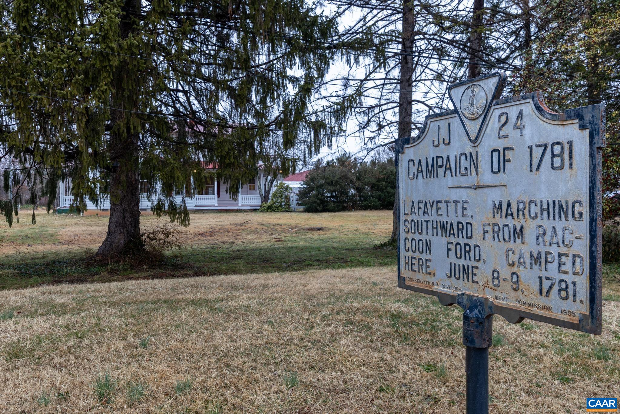 9451 Black Walnut Run Road Rhoadesville, VA 22542 - Photo 70 of 73 a sign board with parking space