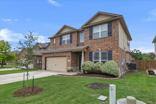a house view with a garden space