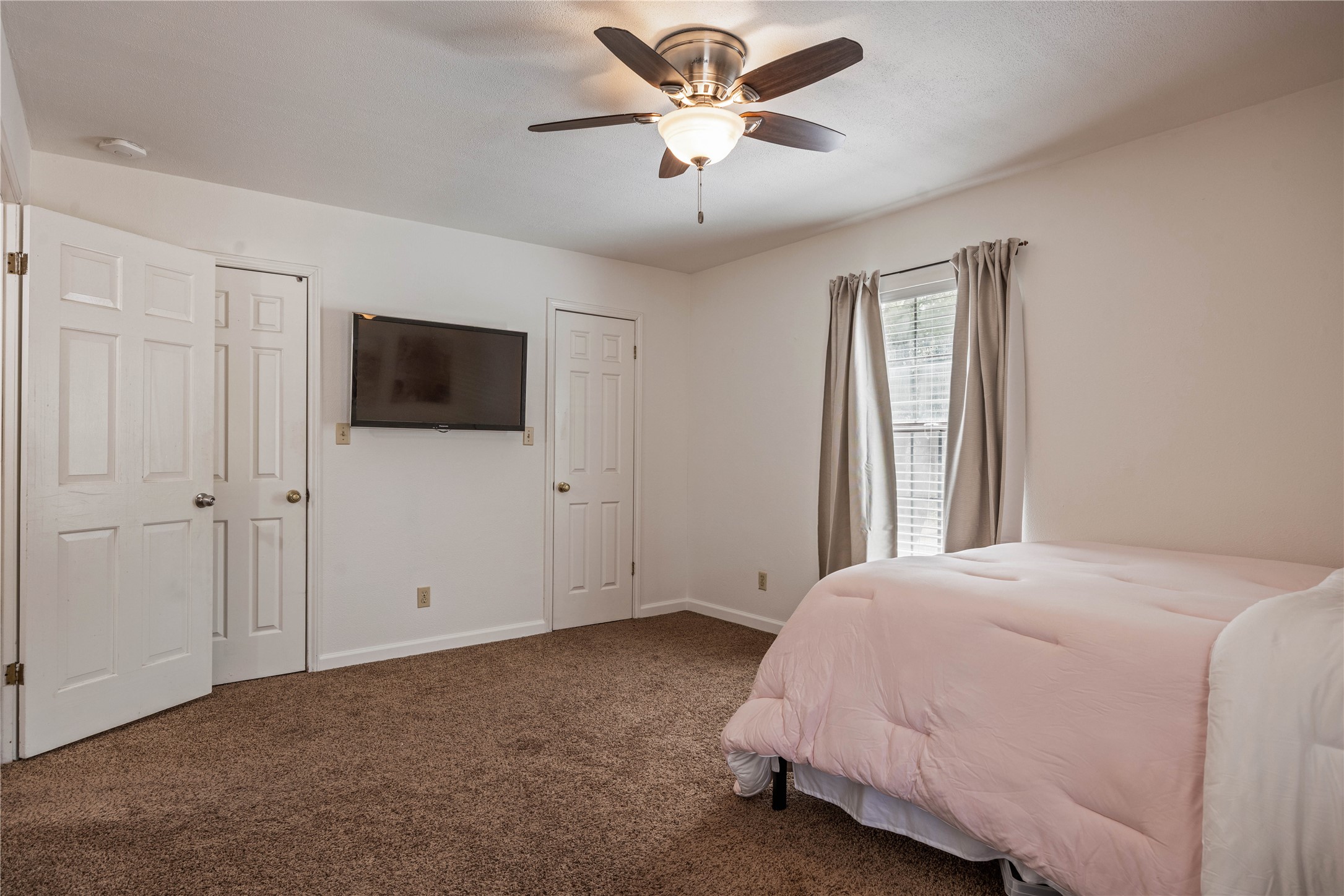446 Roemer Road Elgin, TX 78621 - Photo 29 of 39 View of bedroom #3 featuring two closets.