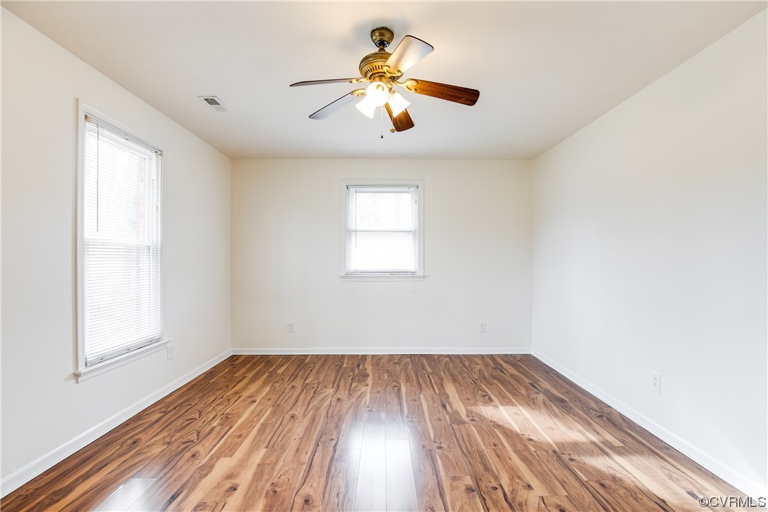 8675 Beatties Mill Road Mechanicsville, VA 23111 - Photo 15 of 25 wooden floor in an empty room with a window