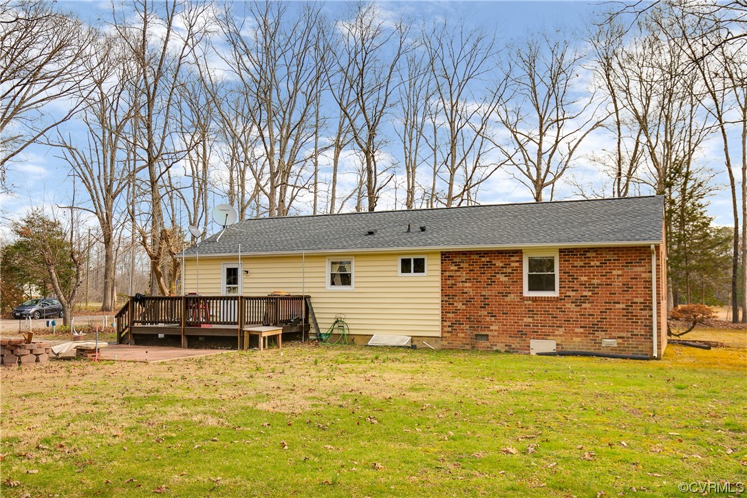 8675 Beatties Mill Road Mechanicsville, VA 23111 - Photo 21 of 25 a front view of a house with a yard