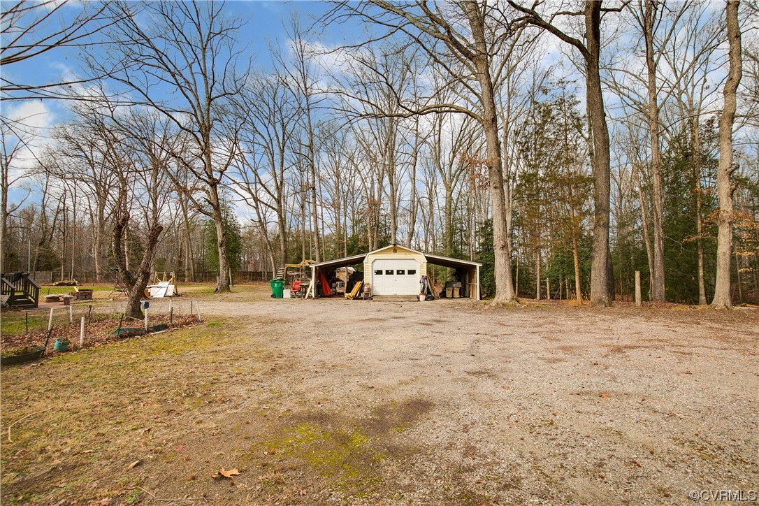 8675 Beatties Mill Road Mechanicsville, VA 23111 - Photo 25 of 25 a car parked on the side of the road