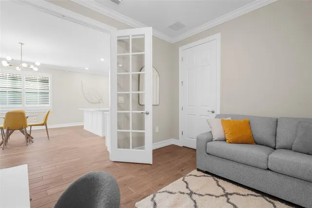 a living room with furniture and a rug