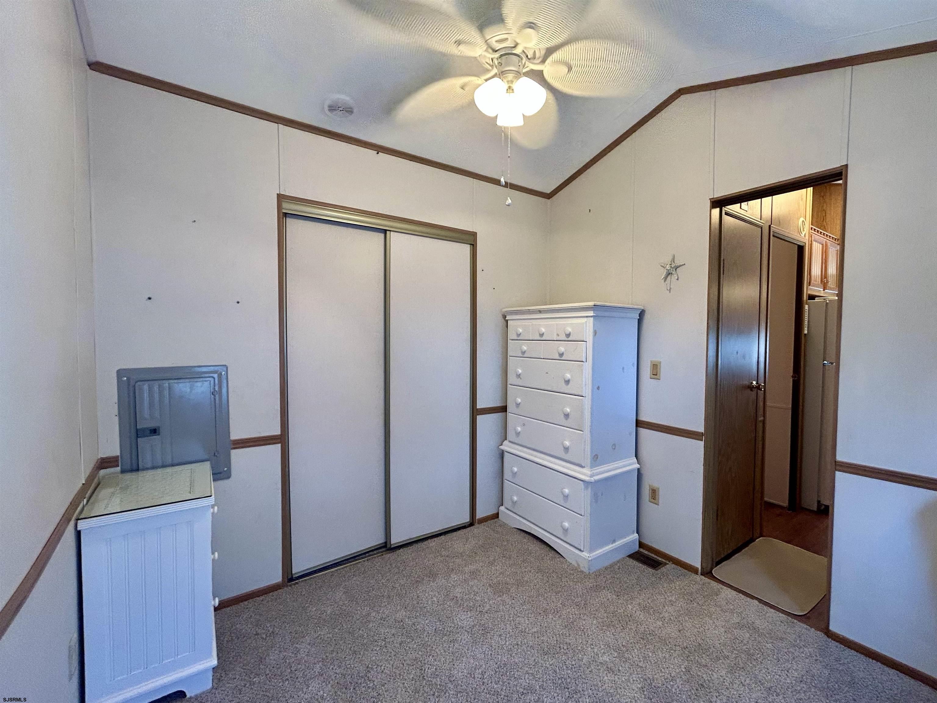 104 South 5th Avenue Rio Grande, NJ 08242 - Photo 14 of 20 an empty room with chandelier fan and closet