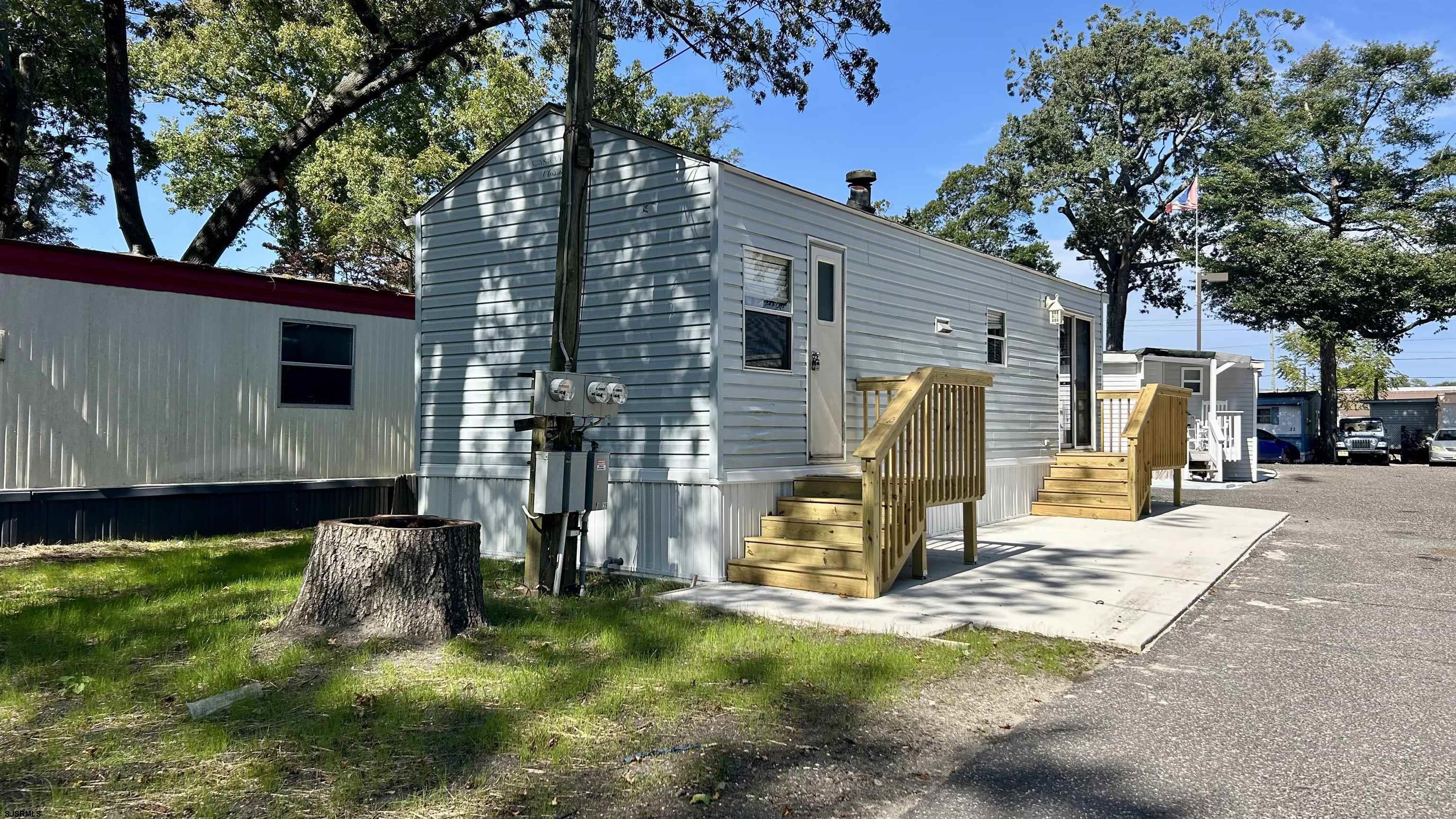 104 South 5th Avenue Rio Grande, NJ 08242 - Photo 3 of 20 a view of a house with backyard and a tree