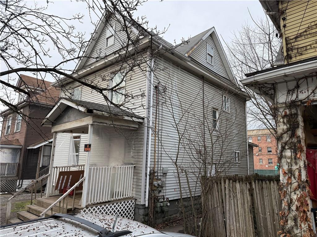 326 West Cunningham Street Butler, PA 16001 - Photo 4 of 5 a view of a house with wooden fence