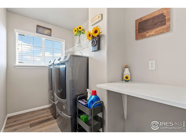 a view of hallway that has closet