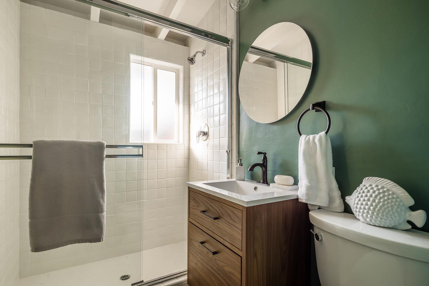 2436 Laura Lane Mountain View, CA 94043 - Photo 13 of 19 a bathroom with a toilet sink and mirror