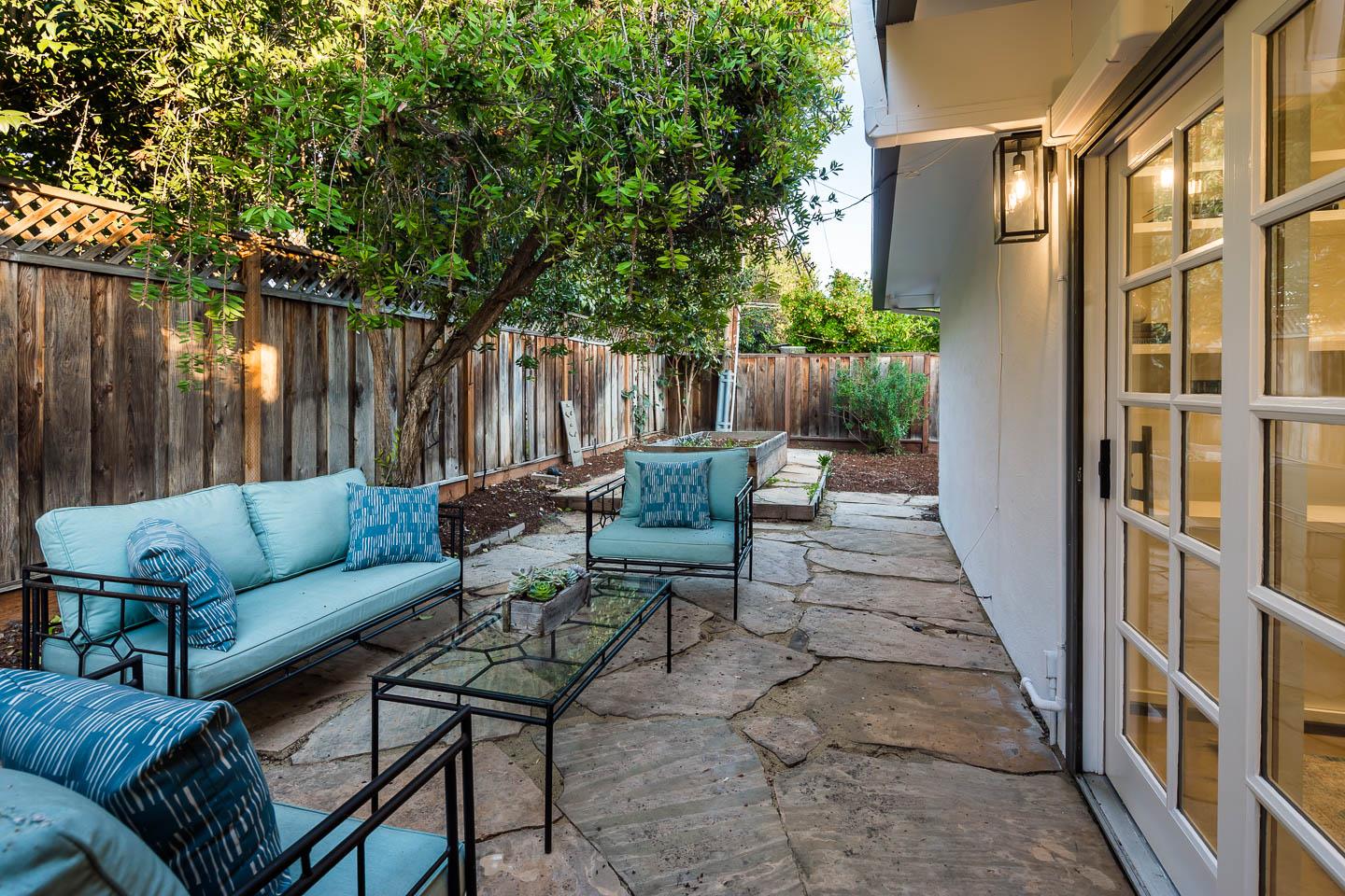 2436 Laura Lane Mountain View, CA 94043 - Photo 17 of 19 a view of a couches in the back yard of the house
