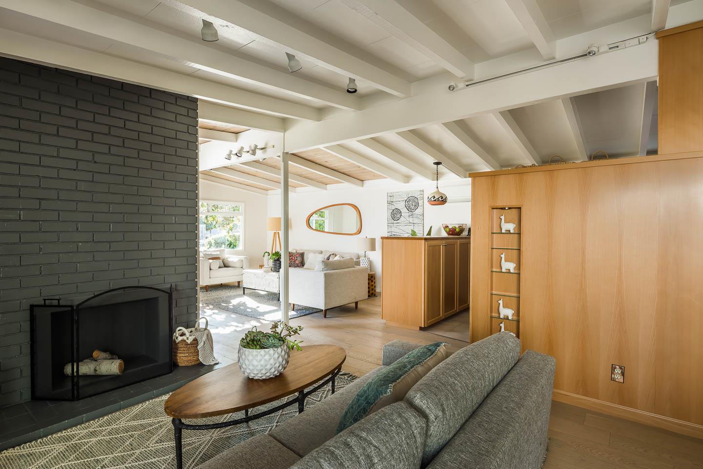 2436 Laura Lane Mountain View, CA 94043 - Photo 5 of 19 a living room with furniture and a fireplace