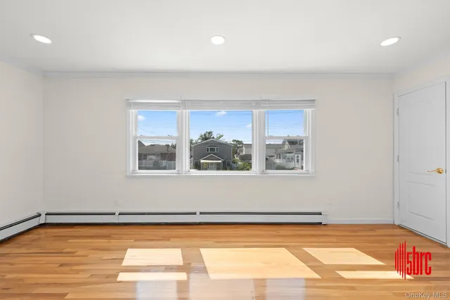 $975,000 | 162-09 99th Street | Old Howard Beach