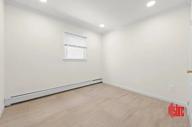 $975,000 | 162-09 99th Street | Old Howard Beach