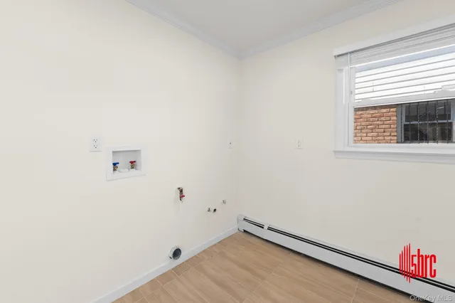 $975,000 | 162-09 99th Street | Old Howard Beach