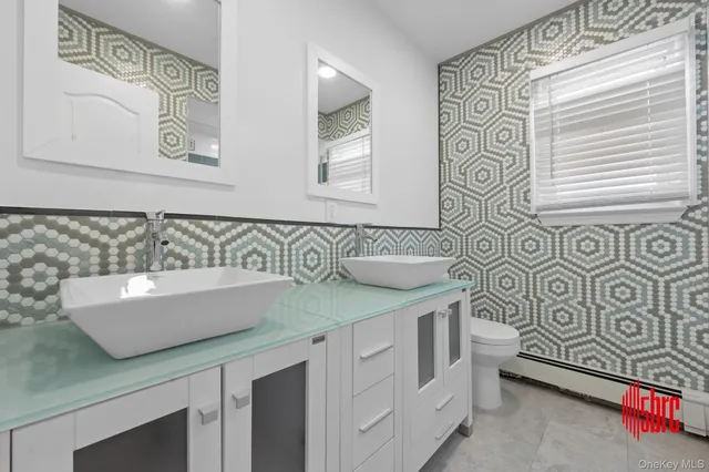 $975,000 | 162-09 99th Street | Old Howard Beach