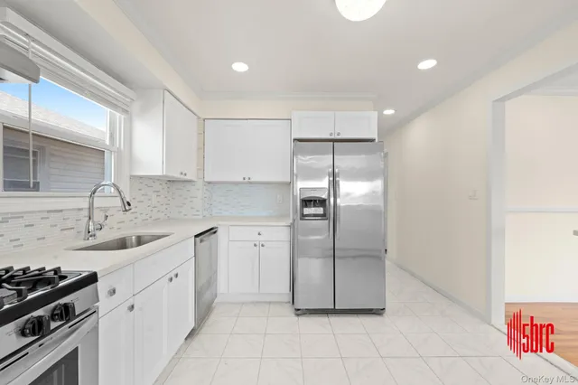 $975,000 | 162-09 99th Street | Old Howard Beach