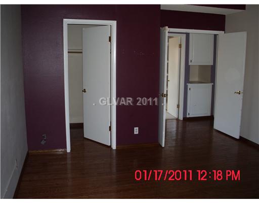 4849 Summerhill Road Las Vegas, NV 89121 - Photo 13 of 24 Master Bedroom.