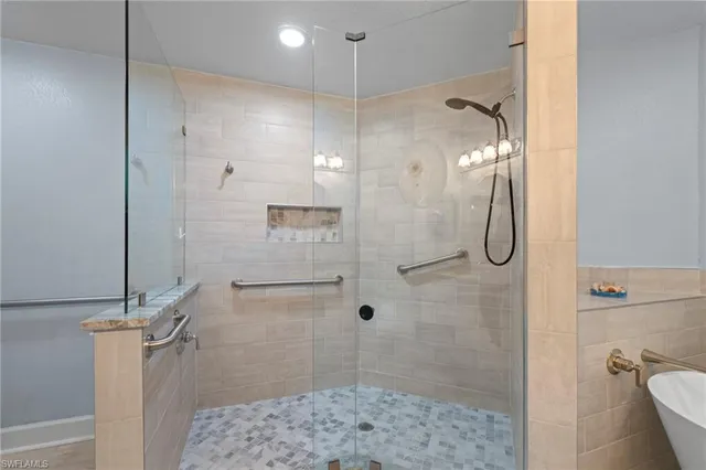 a bathroom with a shower and a toilet