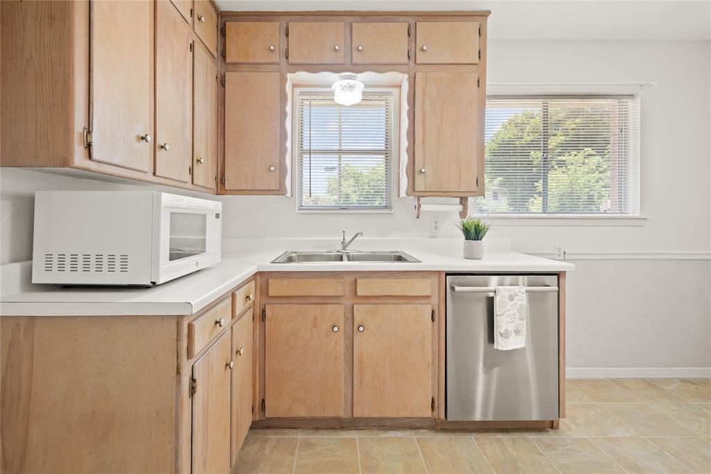 1332 Harrison Lane Hurst, TX 76053 - Photo 12 of 33 Bosch dishwasher and a fridge that stays.