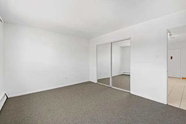 a view of balcony with furniture