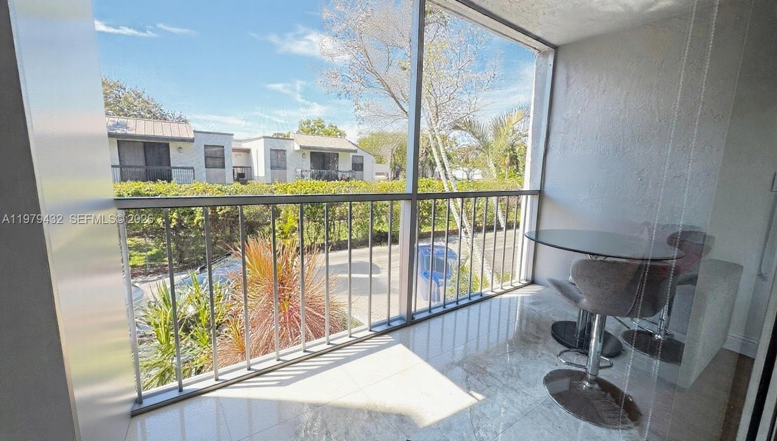 483 North Pine Island Road, Unit C205 Plantation, FL 33324 - Photo 17 of 22 a view of en suite bathroom with furniture and large window