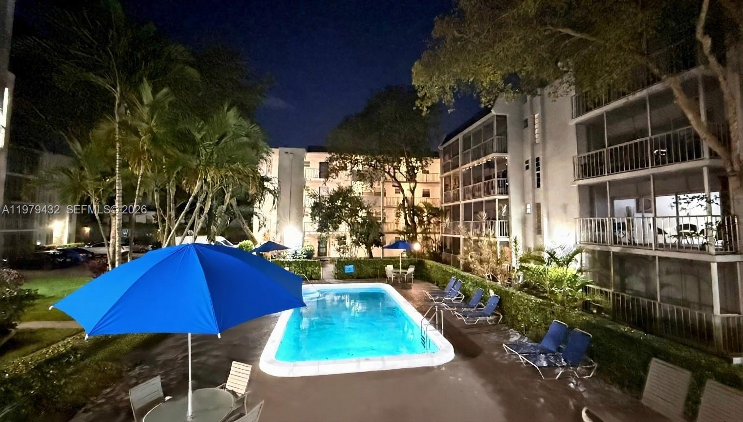 483 North Pine Island Road, Unit C205 Plantation, FL 33324 - Photo 18 of 22 a view of balcony with chairs potted plants
