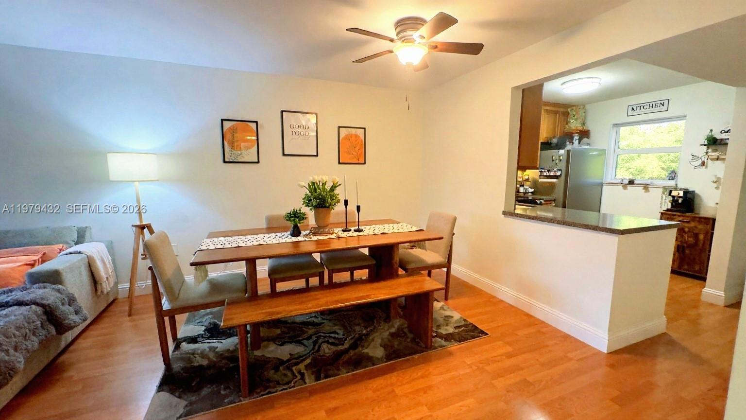 483 North Pine Island Road, Unit C205 Plantation, FL 33324 - Photo 5 of 22 a living room with a bed furniture and a window