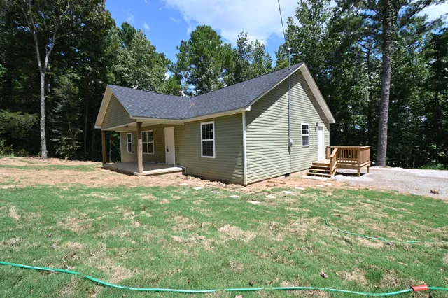a house view with a garden space