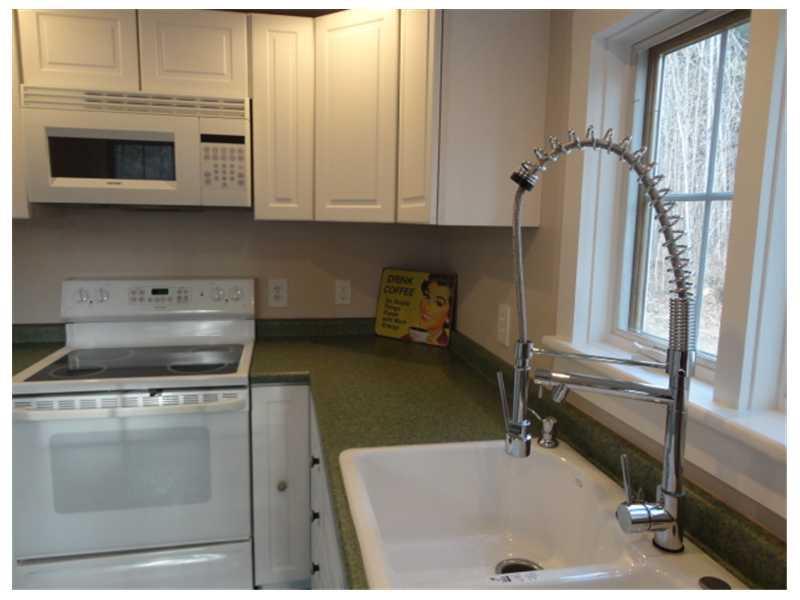 107 Town Farm Road Pittston, ME 04345 - Photo 3 of 35 Kitchen. Fancy faucet