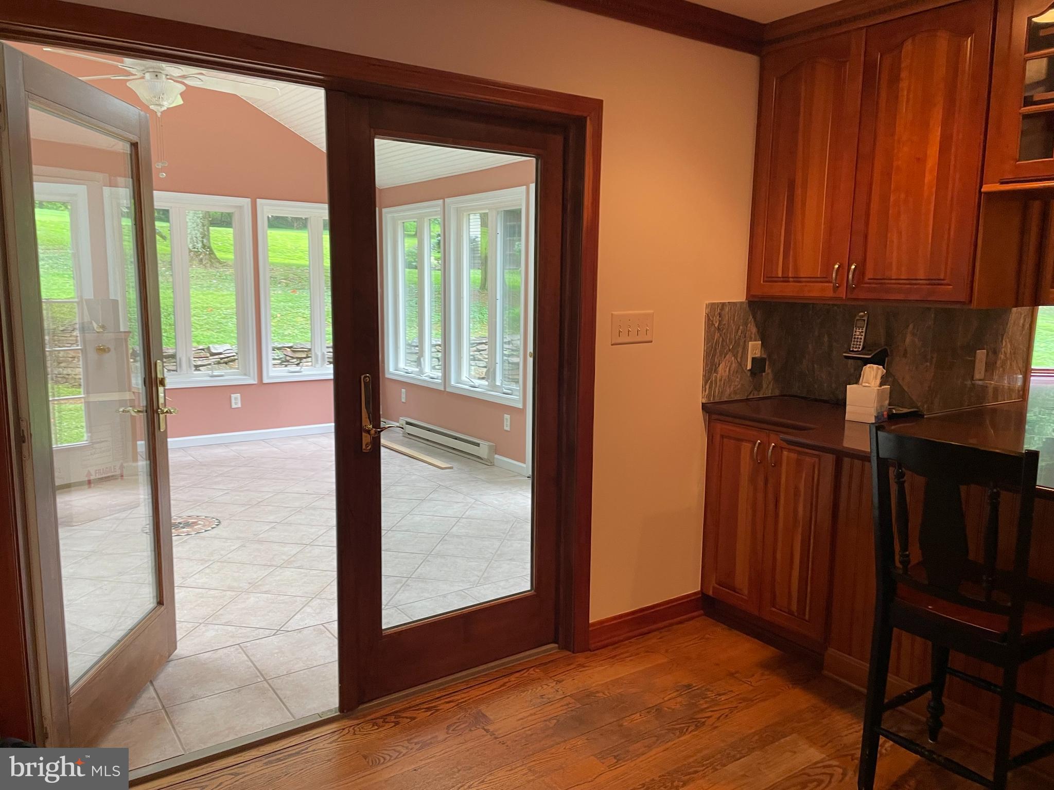 173 Laurel Bridge Road Landenberg, PA 19350 - Photo 14 of 36 View from kitchen to sunroom