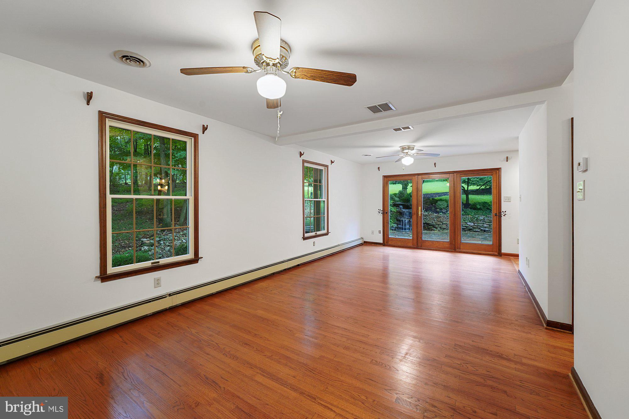 173 Laurel Bridge Road Landenberg, PA 19350 - Photo 17 of 36 Family room/ Dining Room lead to patio