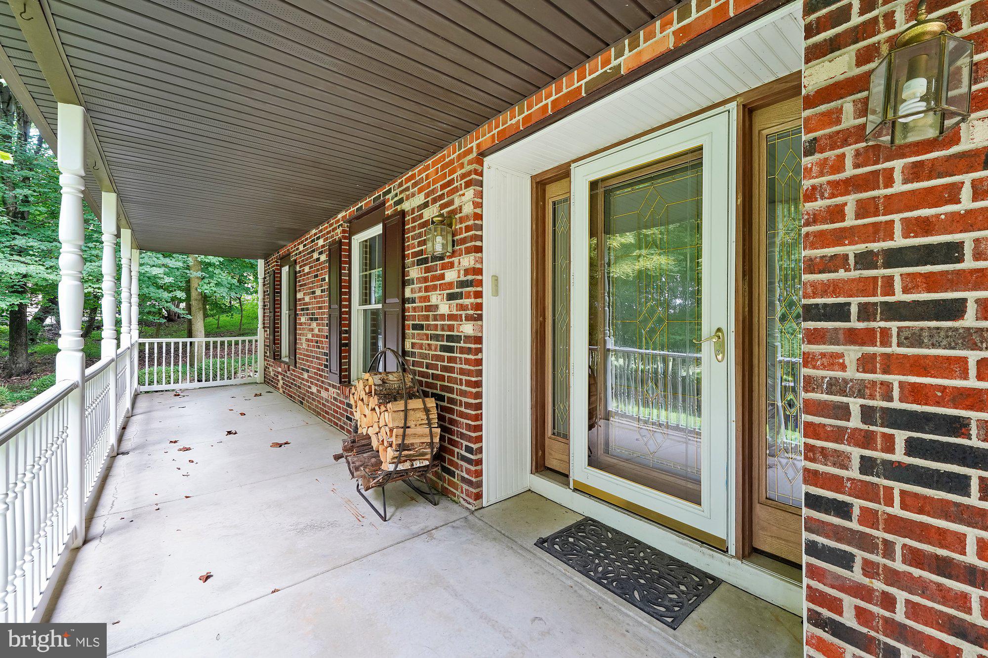 173 Laurel Bridge Road Landenberg, PA 19350 - Photo 4 of 36 Rocking chair porch
