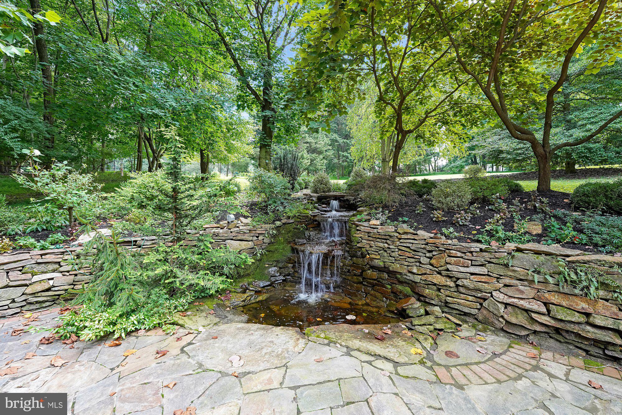 173 Laurel Bridge Road Landenberg, PA 19350 - Photo 32 of 36 One of a kind patio complete with waterfall