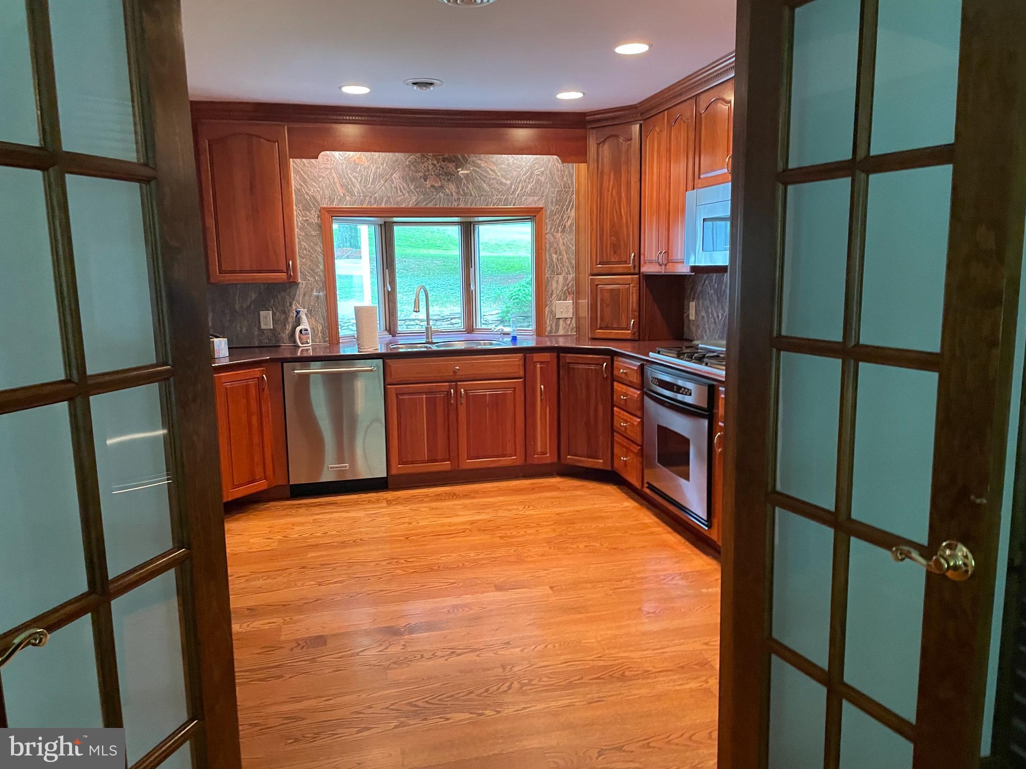 173 Laurel Bridge Road Landenberg, PA 19350 - Photo 7 of 36 View into kitchen from living/family room