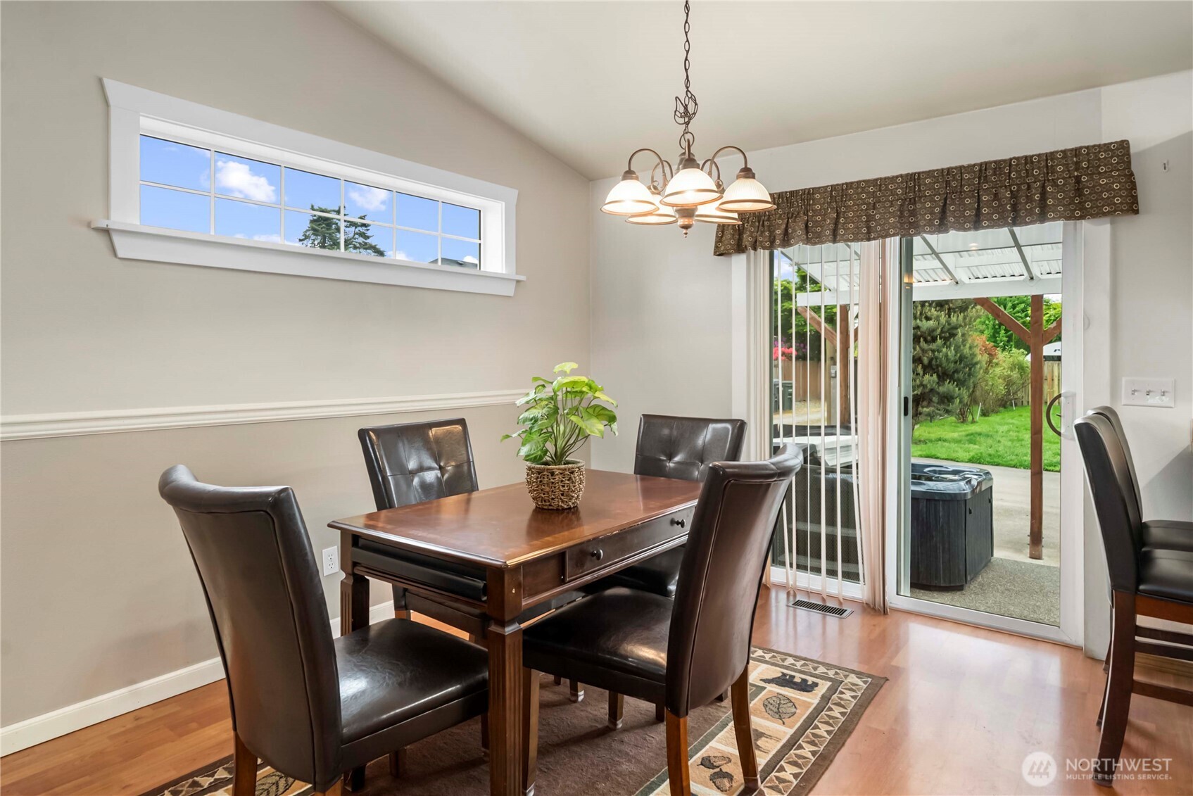 1010 Academy Street Sumner, WA 98390 - Photo 13 of 37 a view of a dining room with furniture window and wooden floor