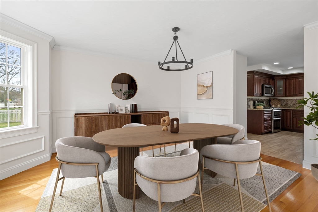 30 Neponset Street Walpole, MA 02071 - Photo 18 of 41 a view of a dining room with furniture and wooden floor