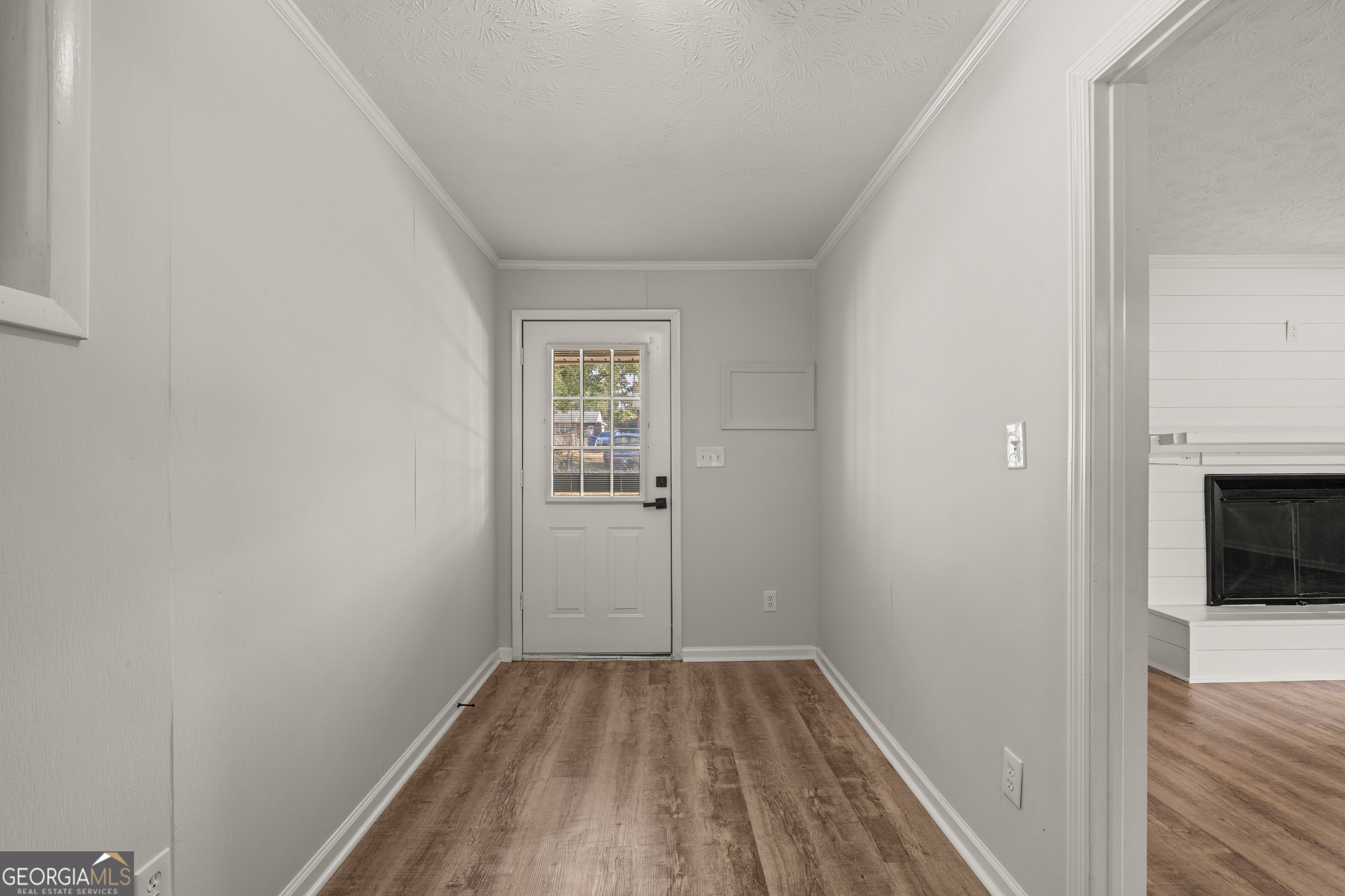 2312 Burnside Drive Columbus, GA 31907 - Photo 15 of 29 a view of a room with wooden floor and a hallway