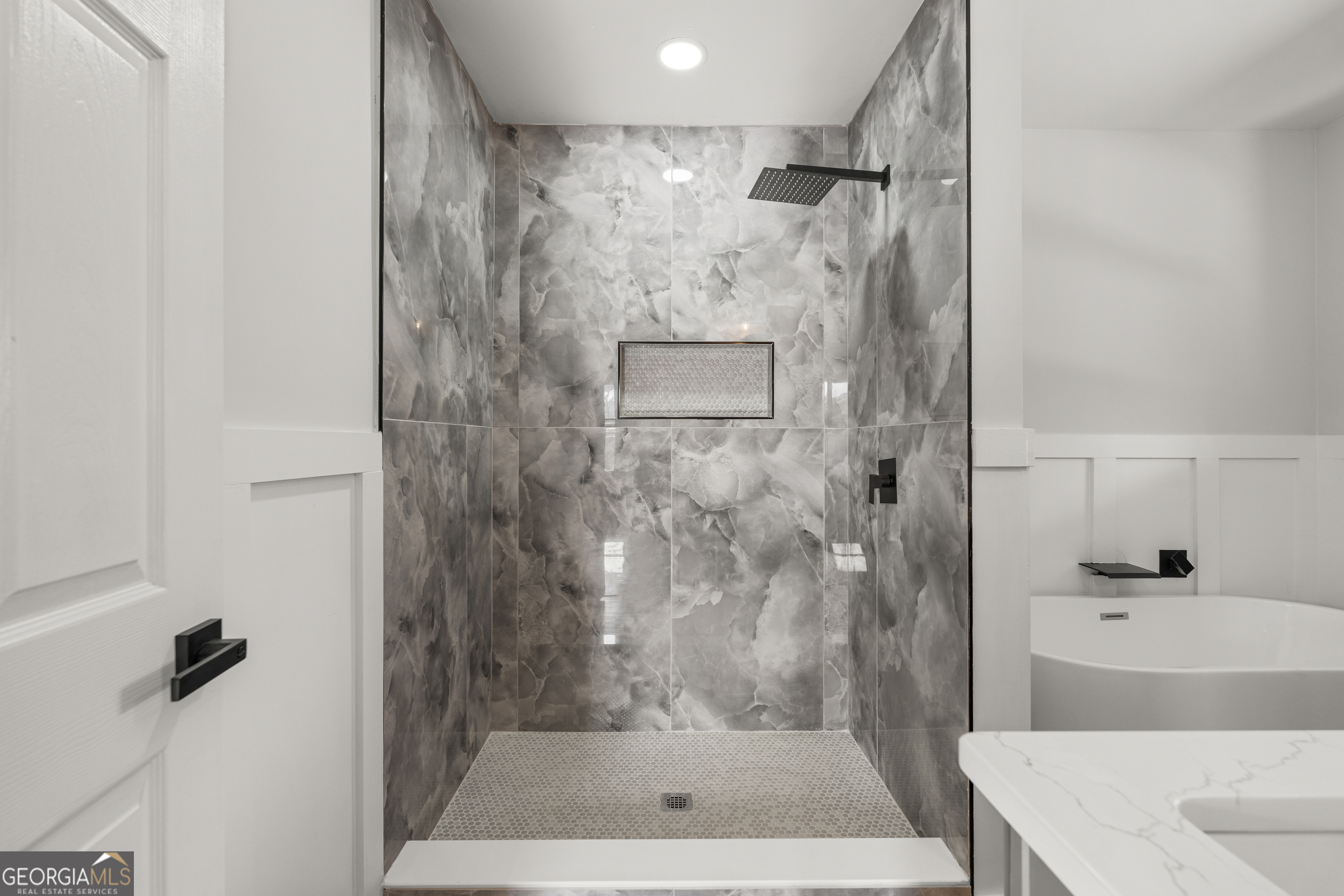 2312 Burnside Drive Columbus, GA 31907 - Photo 22 of 29 a bathroom with a shower and a sink